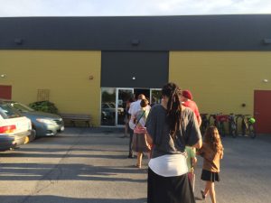 The line to get into the Space at Greenstar for the community read of "The New Jim Crow" went out the door Monday night. 